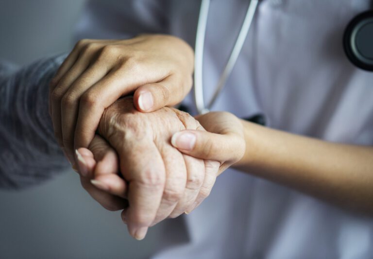 Closeup of a support hands of an in-home caregiver
